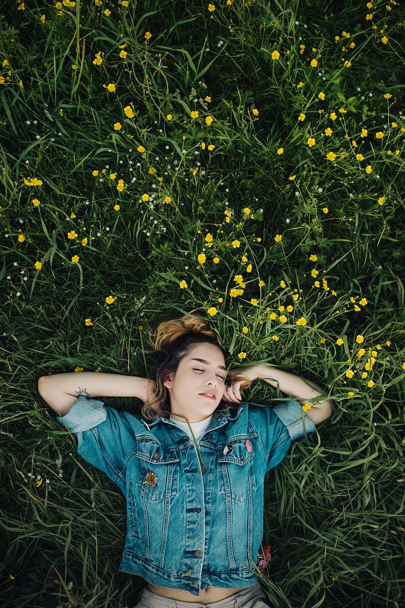 people woman lying on grassland human