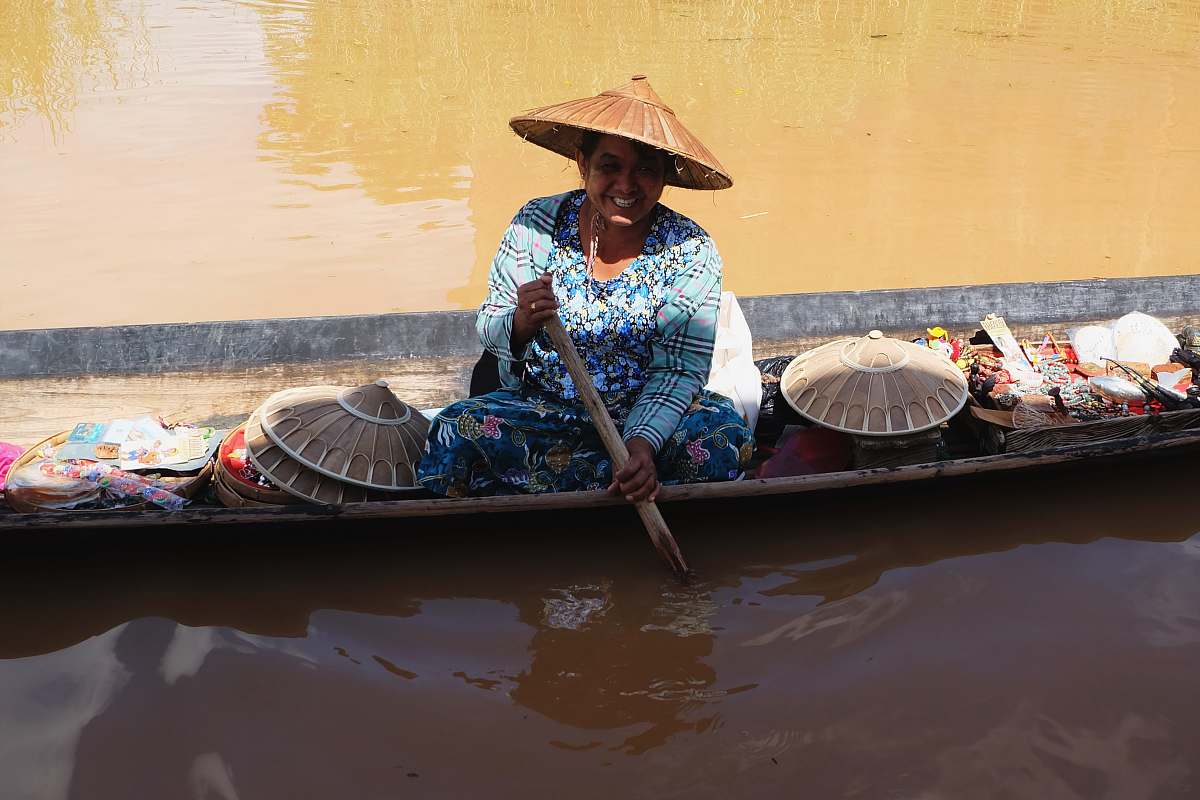 people woman rowing boat on body of water boat