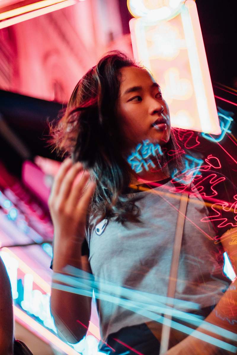 people woman standing near red lights human