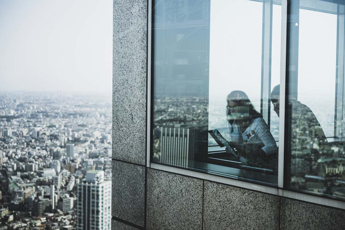 people woman standing near window human