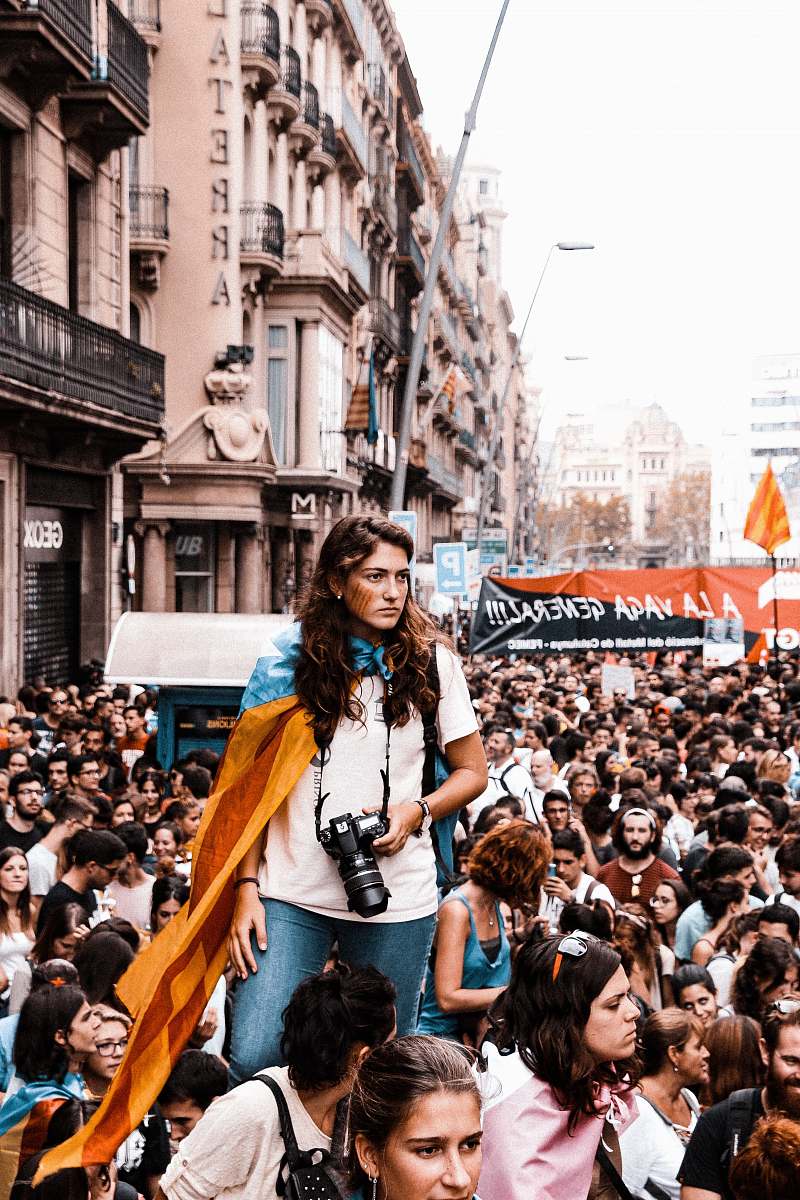 people woman standing on crowd of people human
