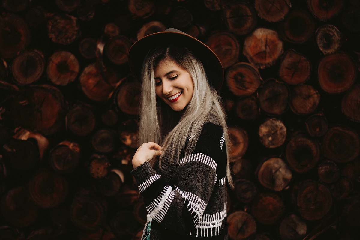 people woman wearing black and white striped long-sleeved top human