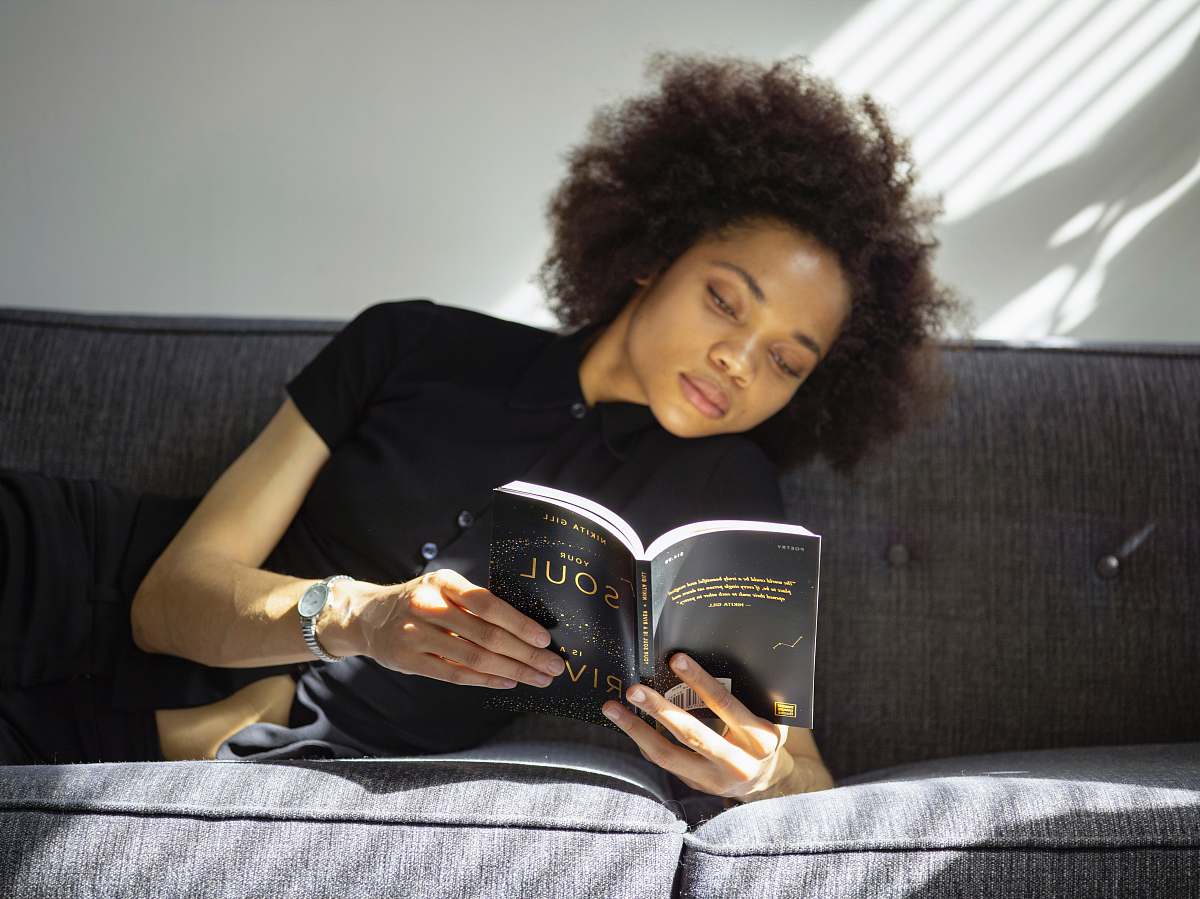 people woman wearing black polo shirt human