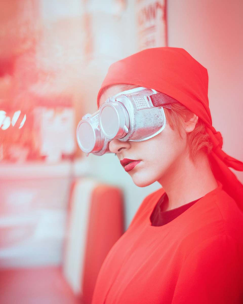 accessory woman wearing gray VR headset goggles