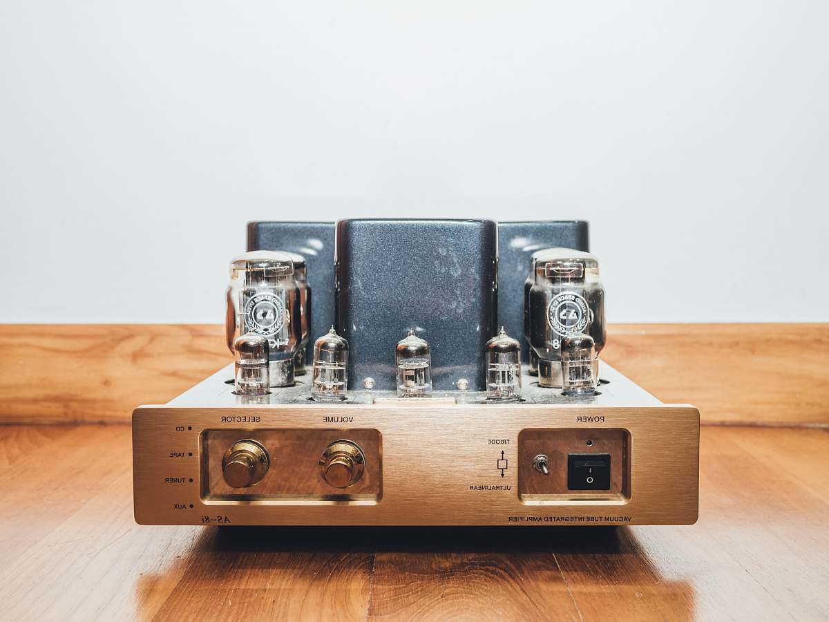 music gray CB radio wooden floor