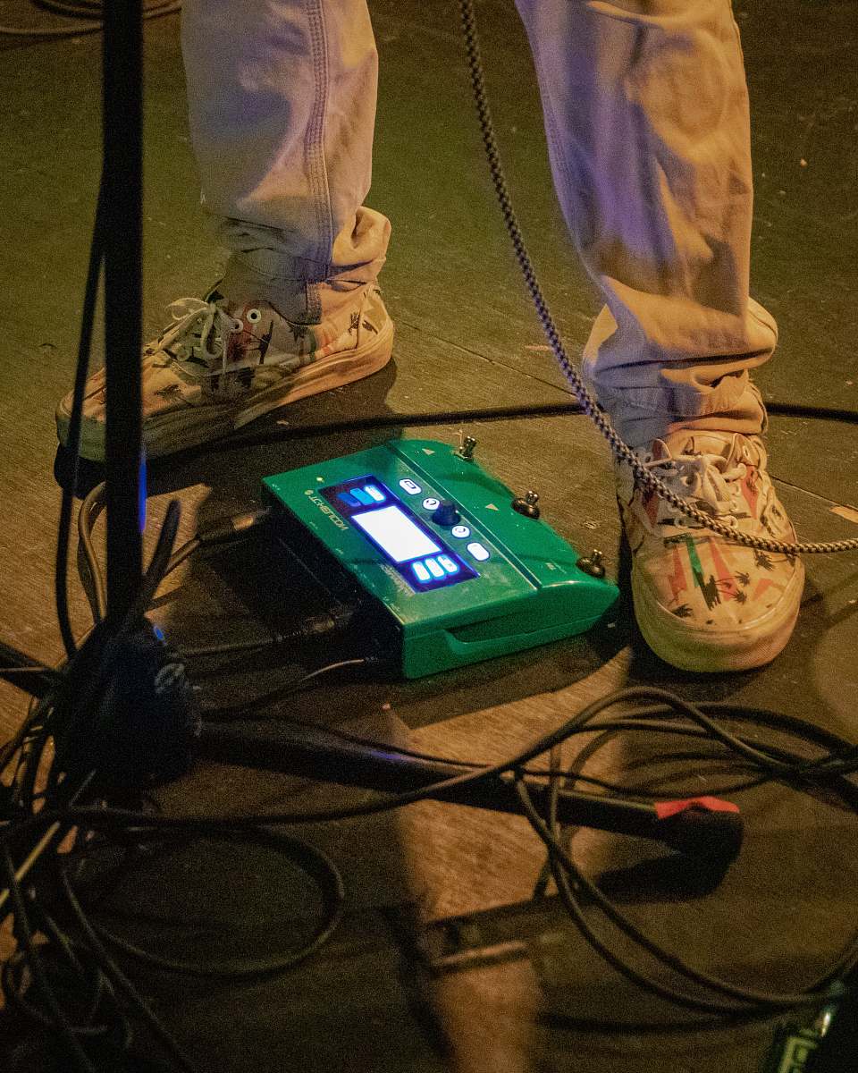 clothing person in gray pants wearing gray low-top sneakers footwear