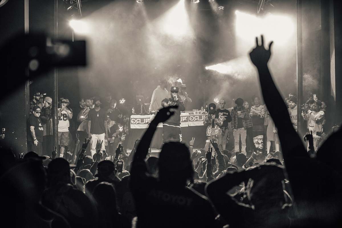 crowd group of people in front of the concert stage concert