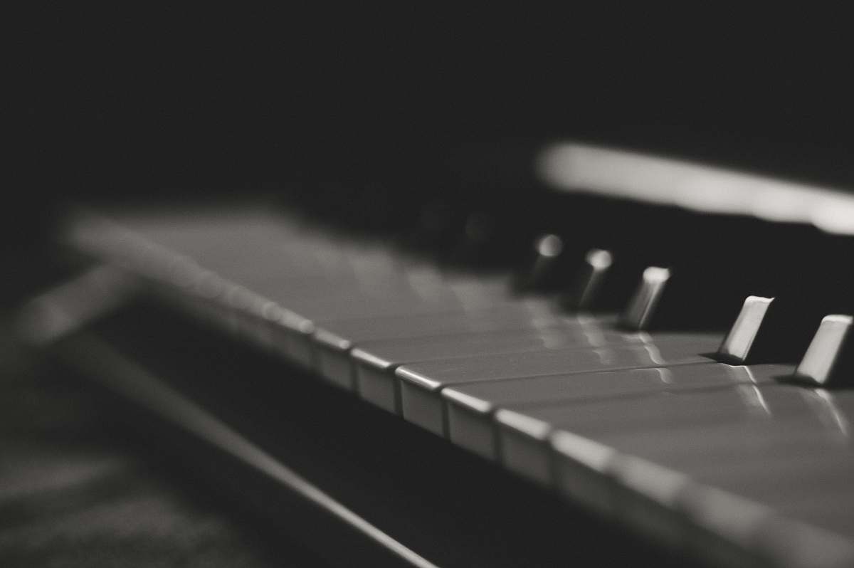 grey grayscale photography of piano keys domino