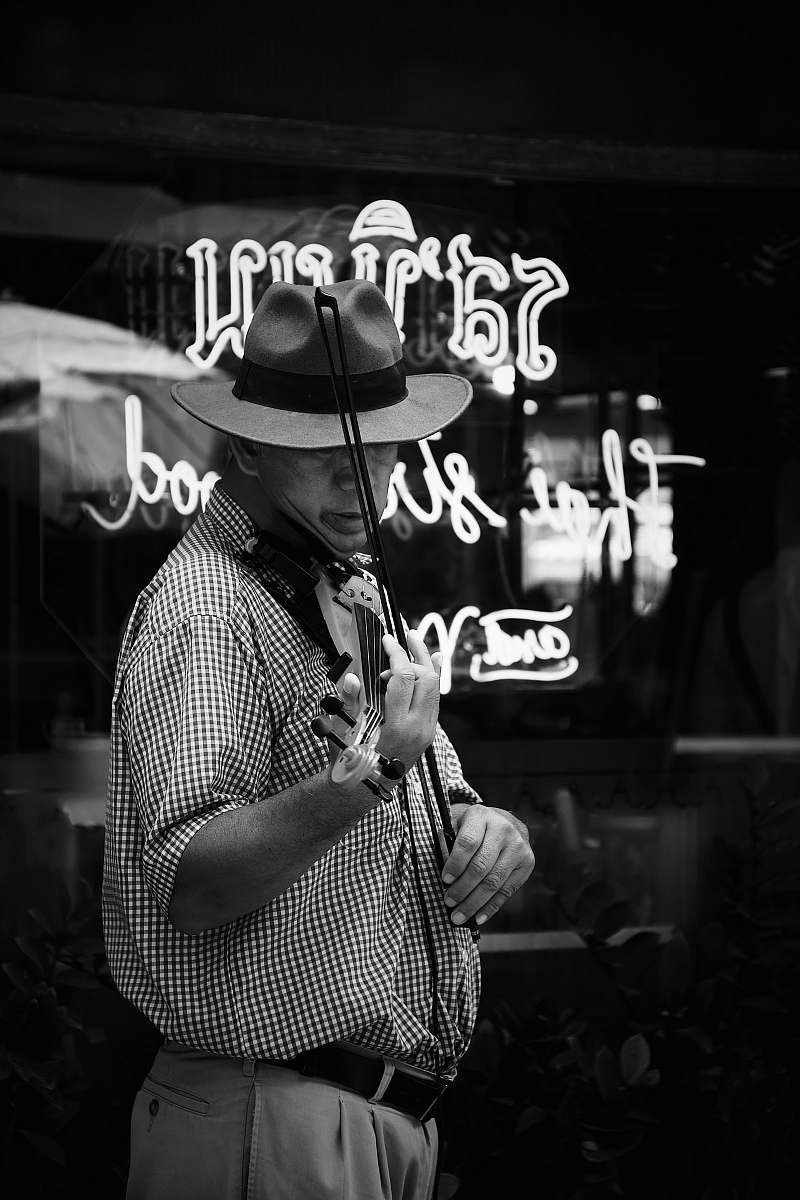 apparel man playing violin clothing
