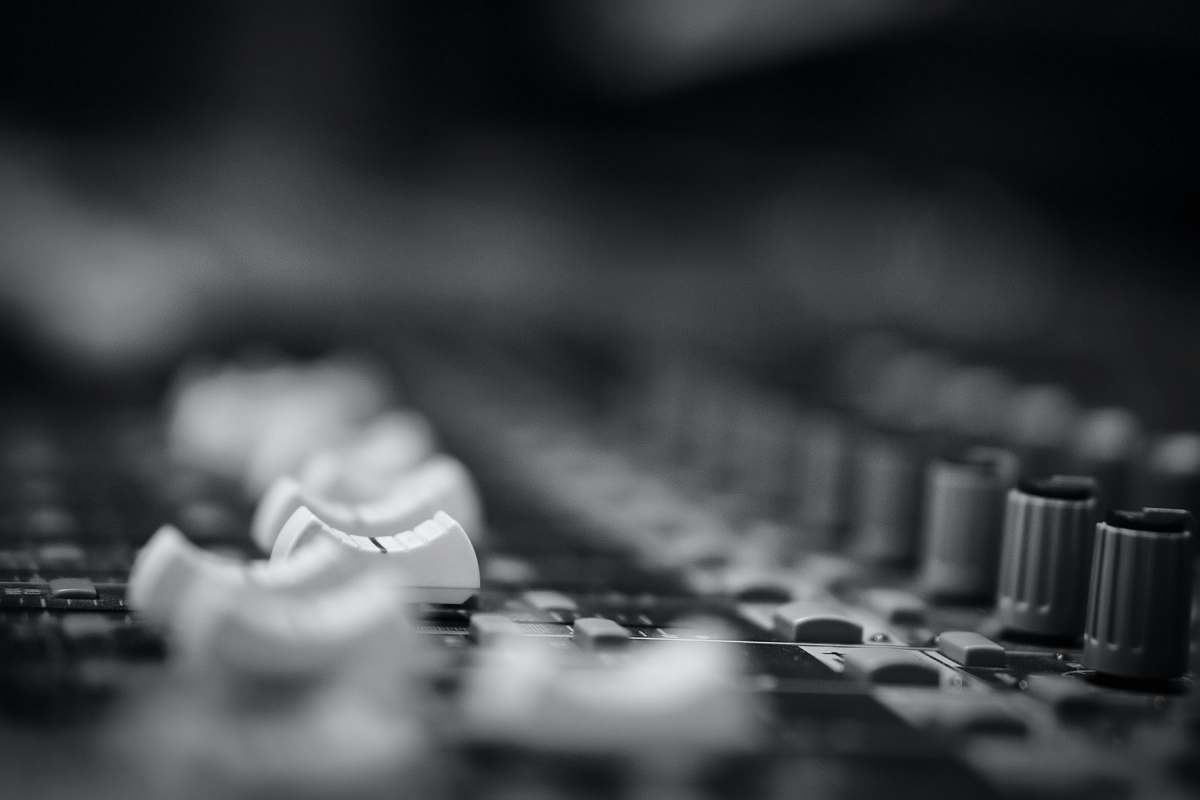 grey selective grayscale photography of mixing console recording table