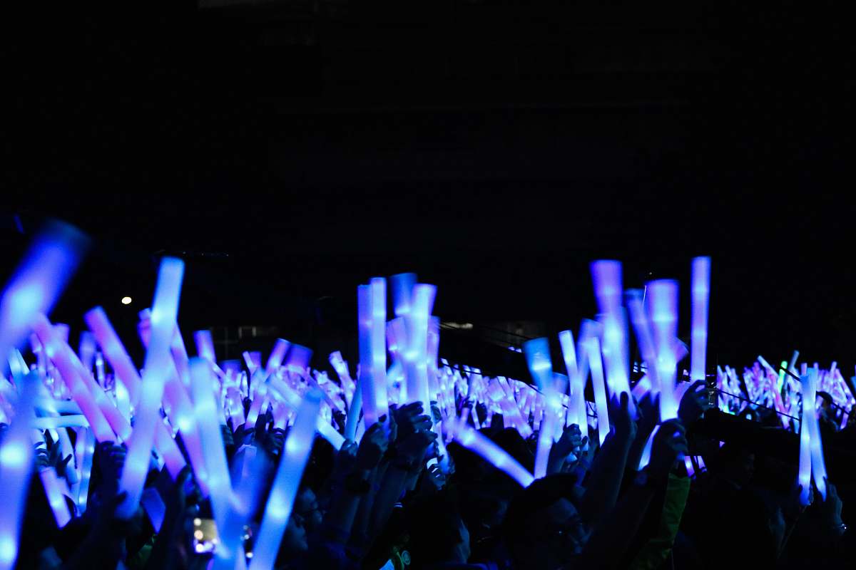 lights people holding light bars illuminated
