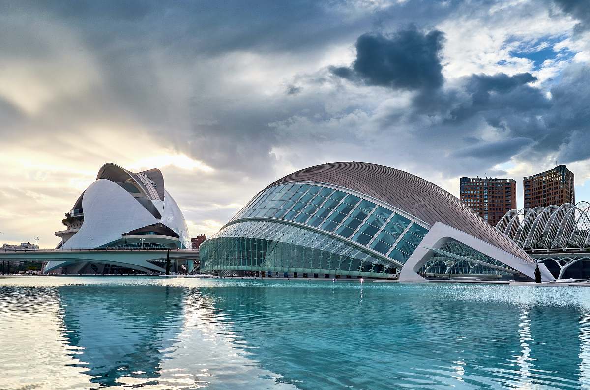 architecture white and gray commercial building near swimming pool spain