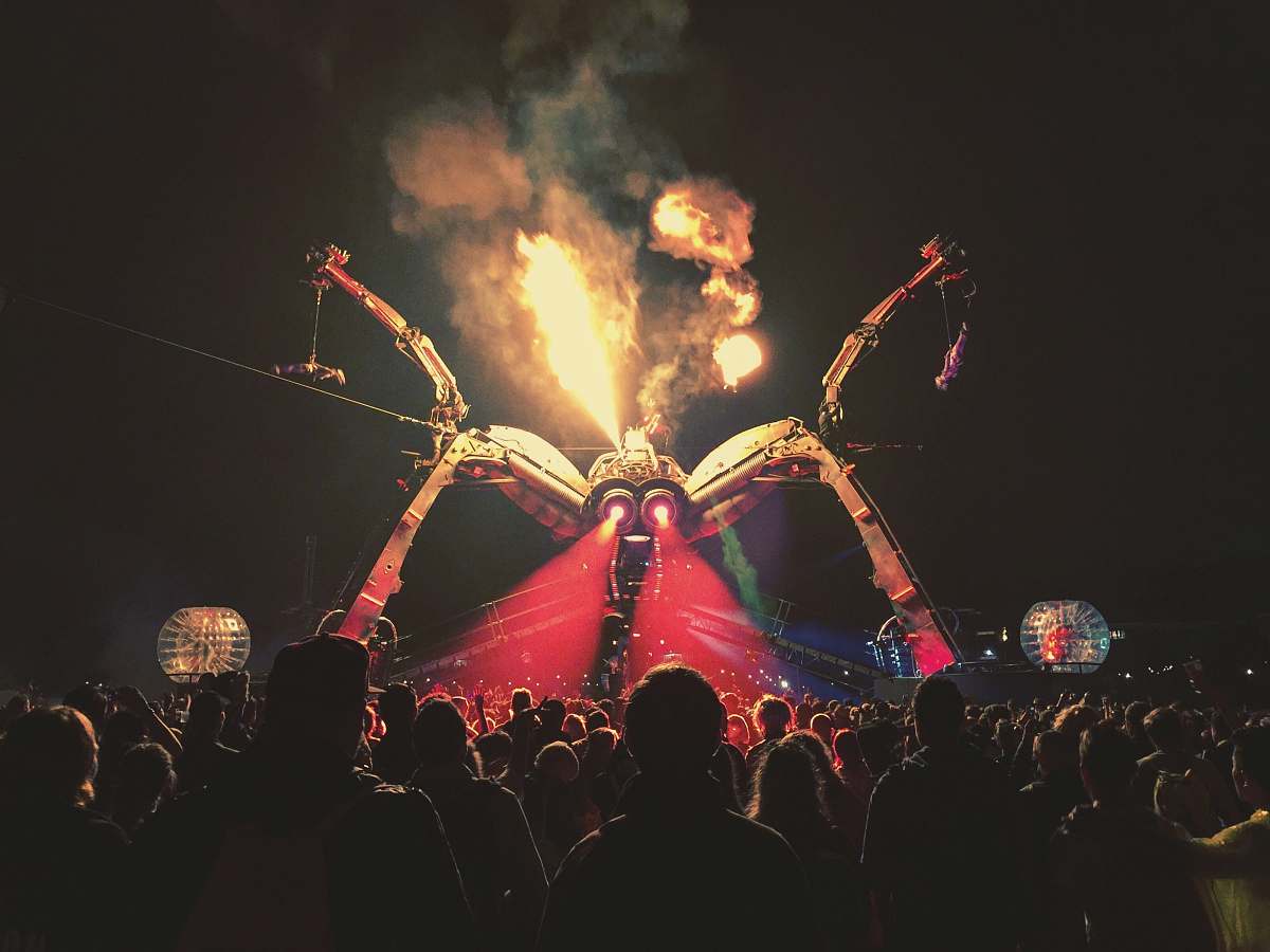crowd people gathering on stage glastonbury