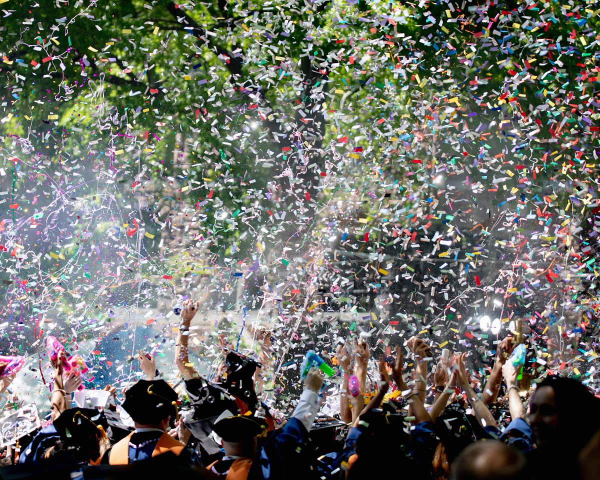 paper people covered by confetti new haven
