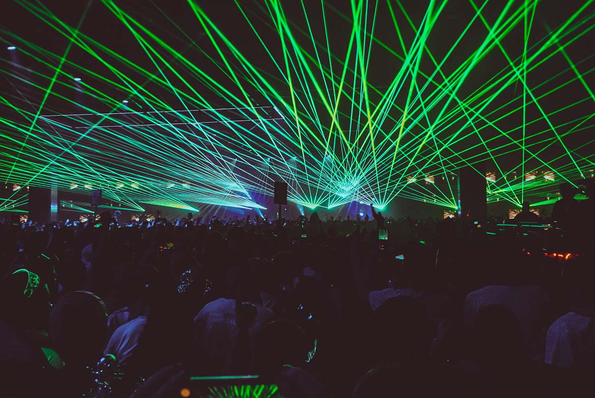light group of people gathering on part laser