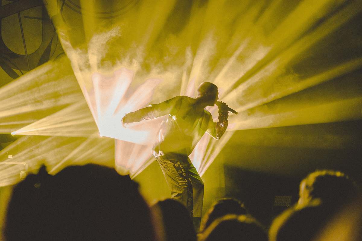 norway man standing while performing band in front of crowded people man