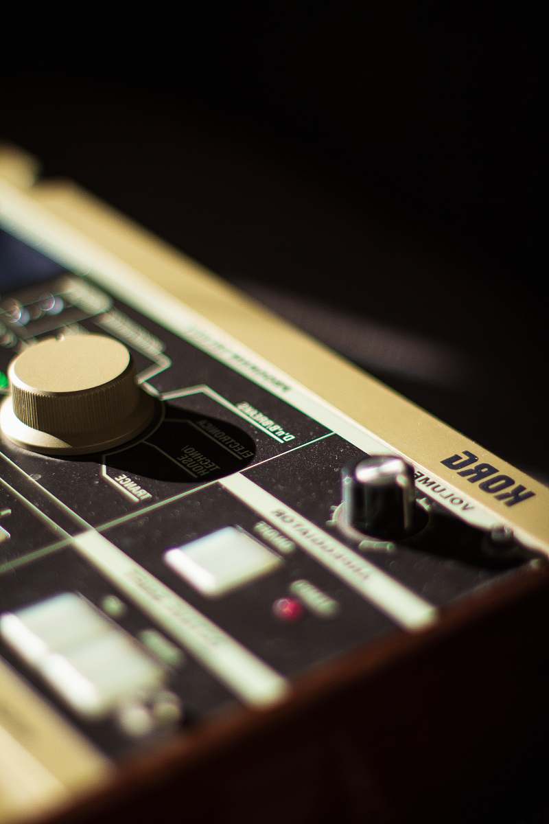 phone gray Korg music system on black background mobile phone