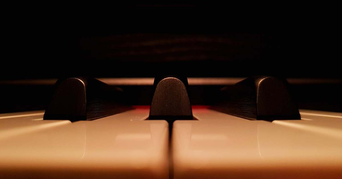 piano shallow focus photo of piano keys keyboard