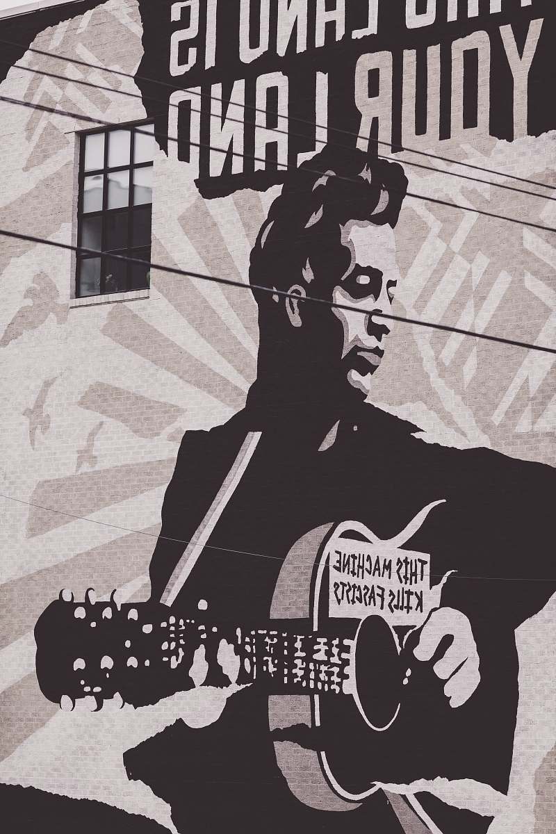 poster man playing guitar poster advertisement