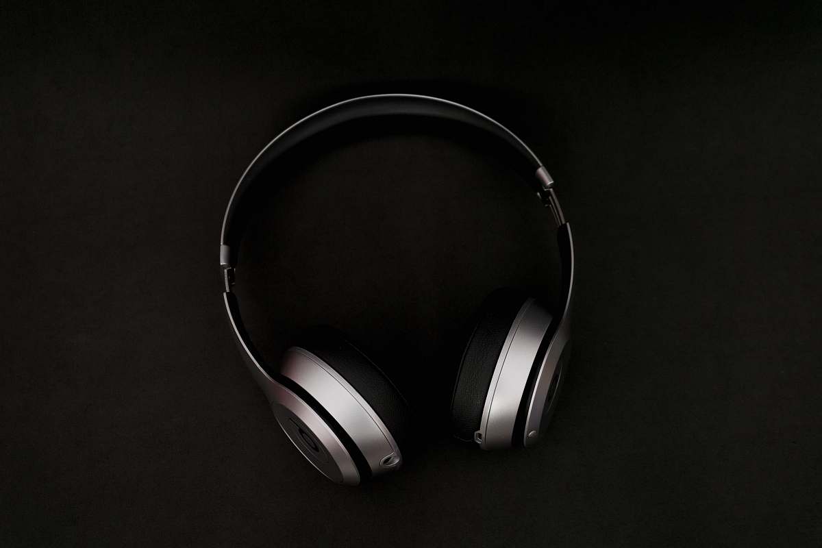 Black-and-white Silver Headphones On Top Of Black Surface Black Image ...