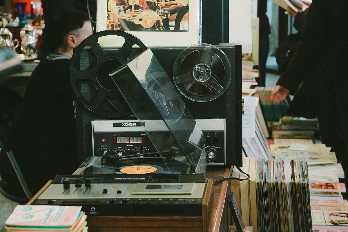 person black reel-to-reel tape recorder reel