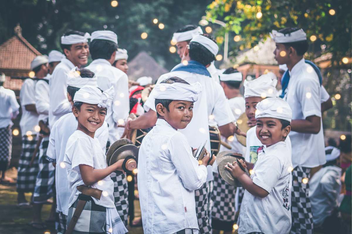 person boys participating parade holding handheld cymbals people
