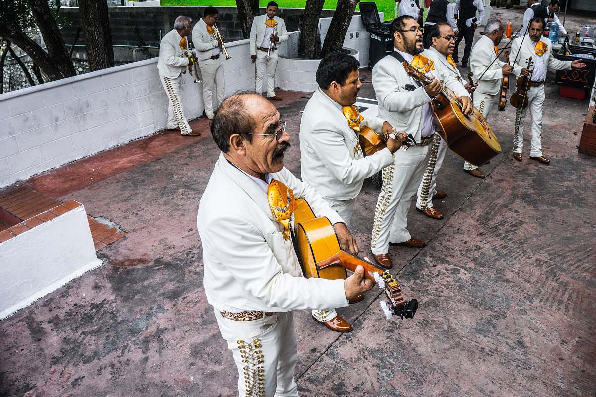 person group of musicians playing instruments on stage people