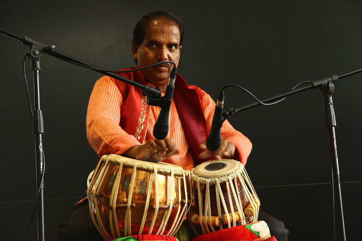 person man playing a drum instrument people
