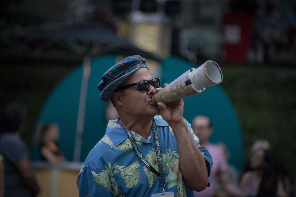 person man using megaphone sunglasses