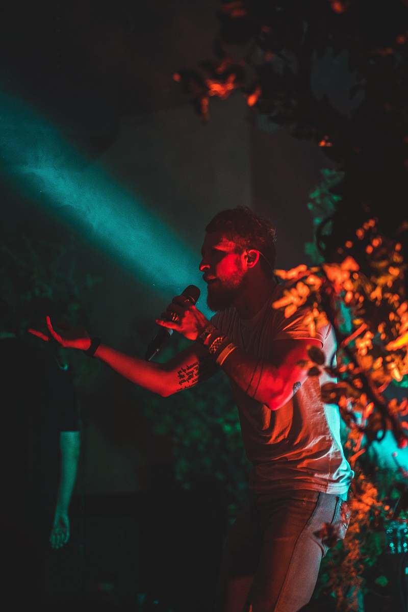 person man using microphone club