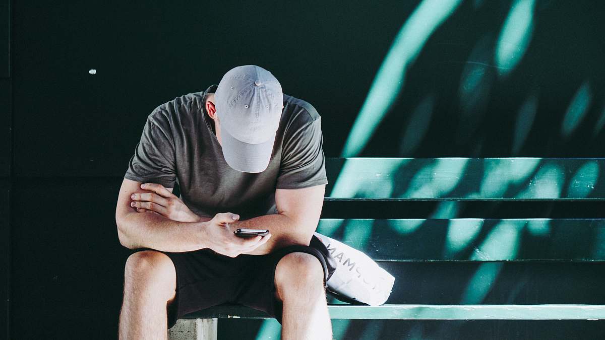 person man using smartphone white sitting people