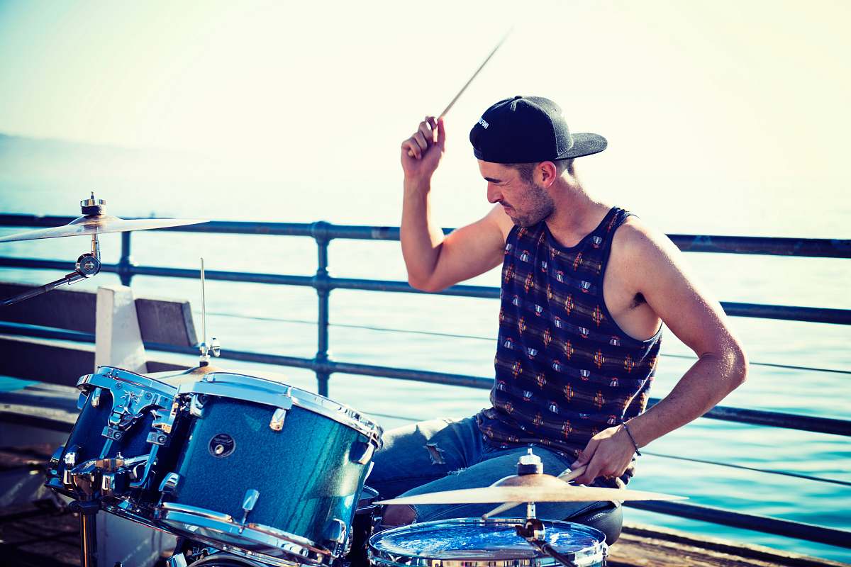 person men playing acoustic drum kit people