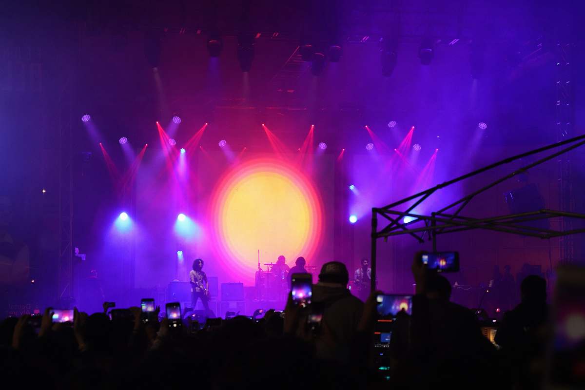 person people inside stadium stage