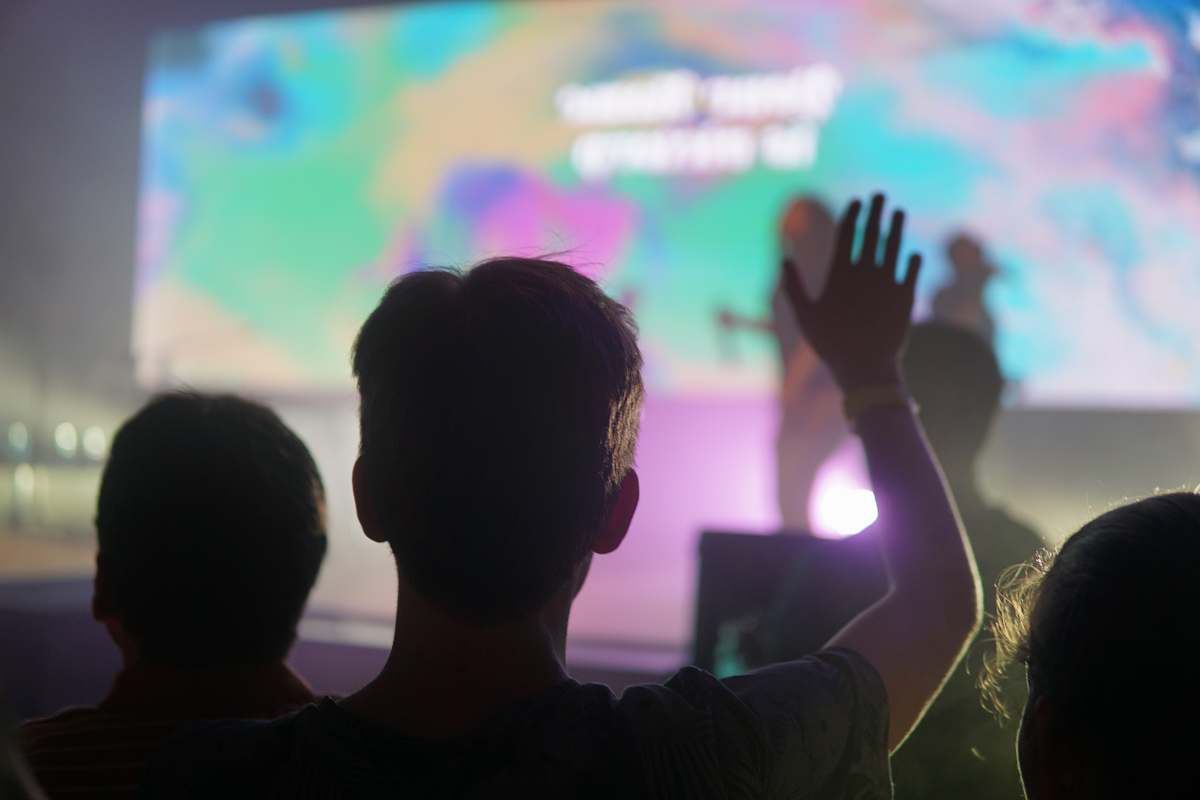 person people standing near stage crowd