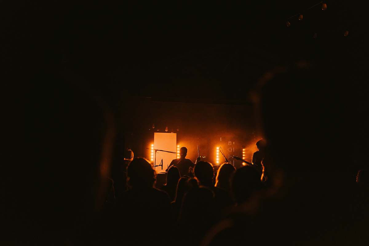 Person People Watching Men Performing On Stage Light Image Free Photo