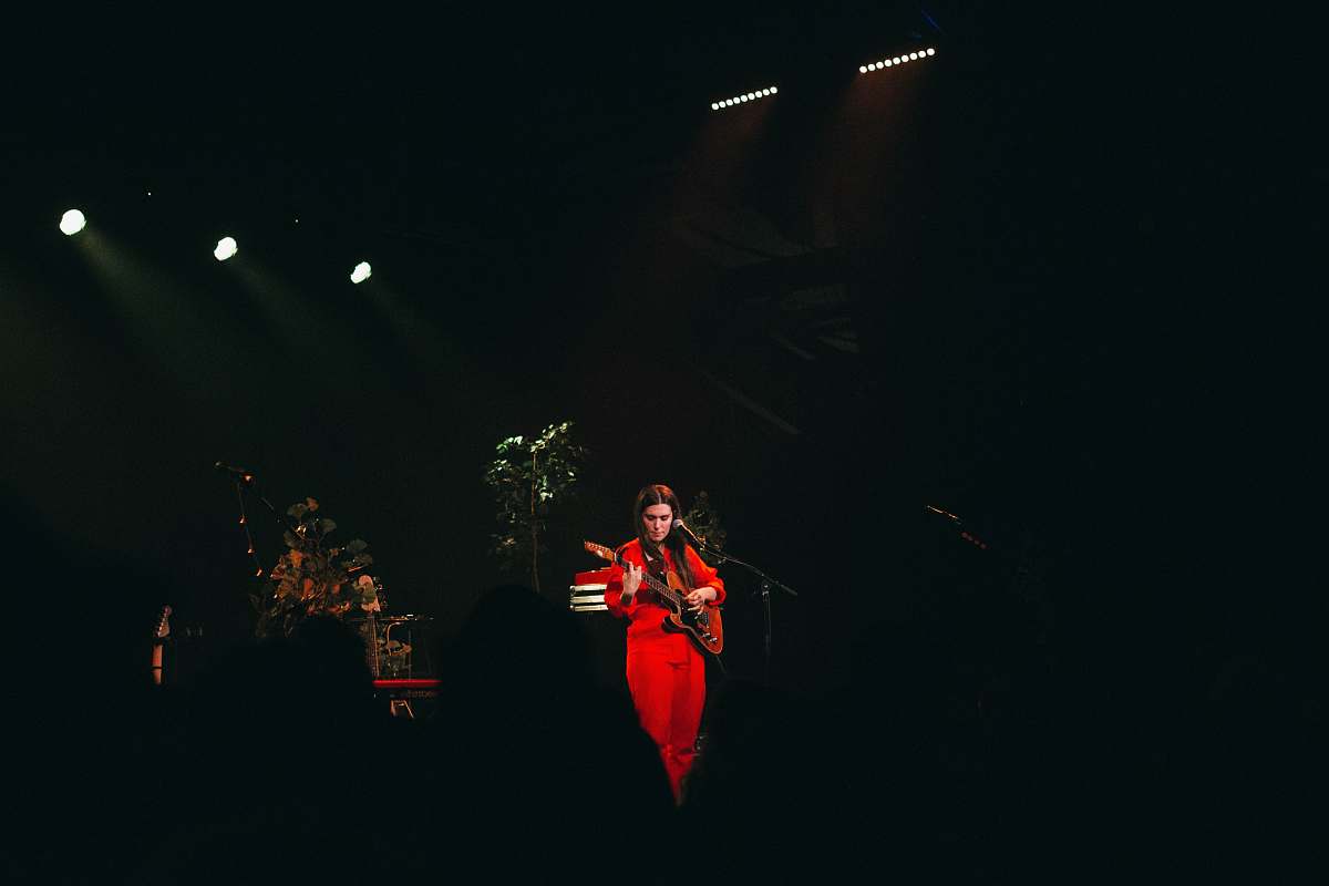 person person in red clothes playing guitar guitar
