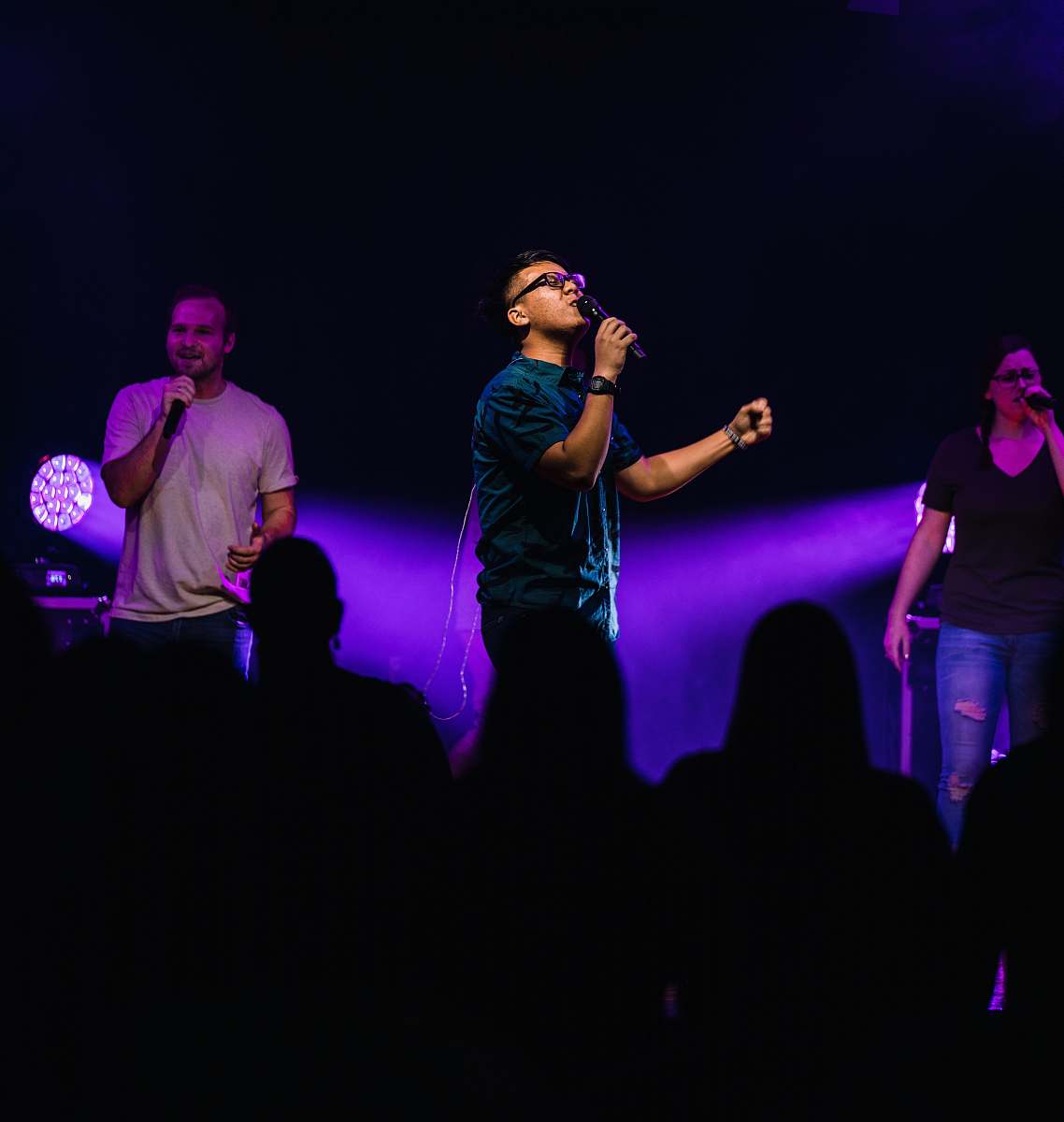 Person Selective Focus Photography Of Three People Performing On Stage ...