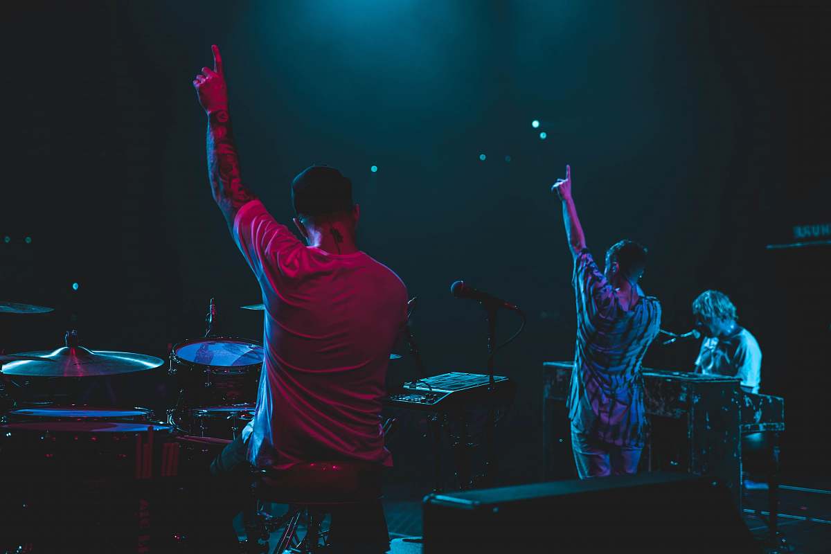 people two person raising hands person