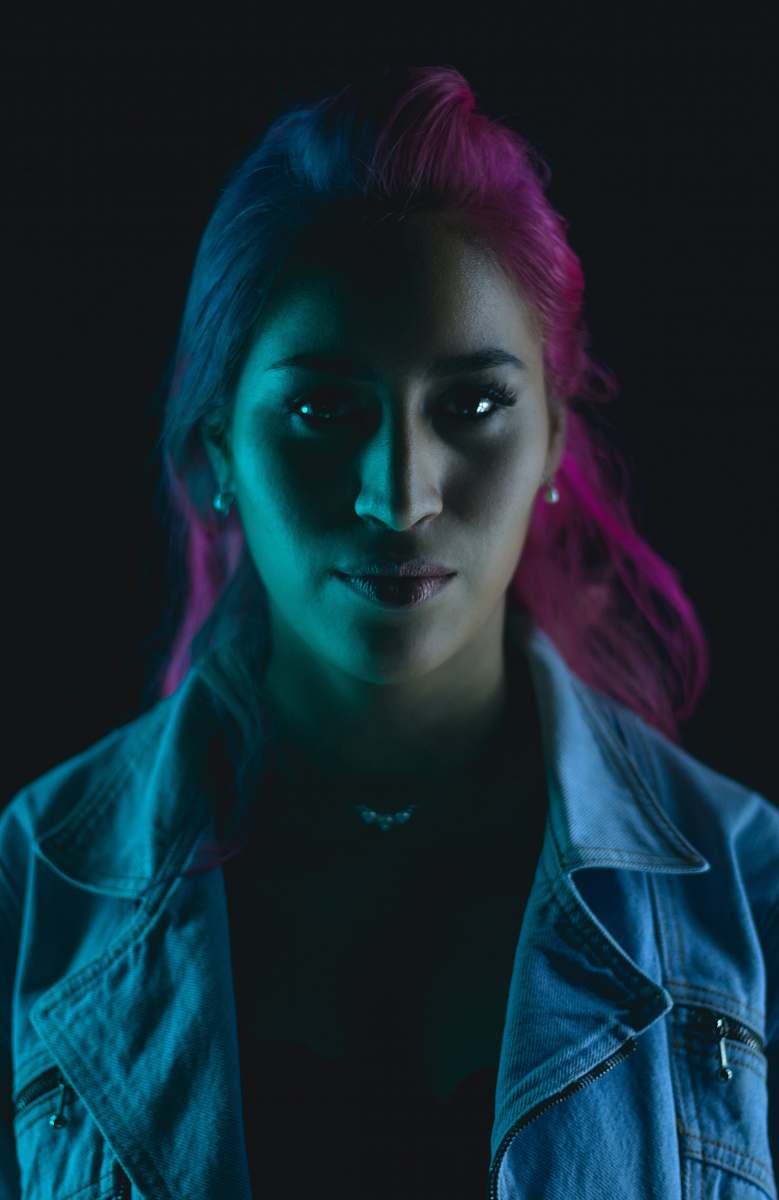 person woman in blue collared jacket close-up photo people