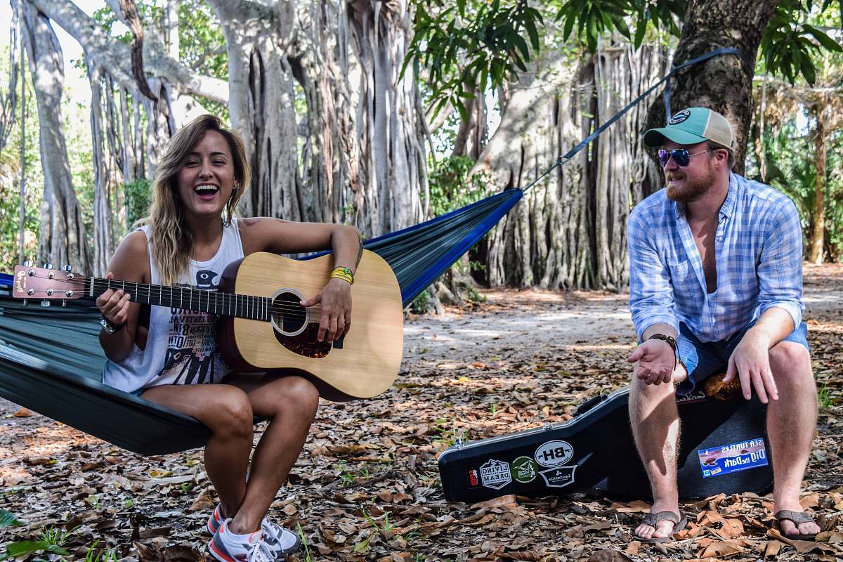 people woman sitting green hammock person