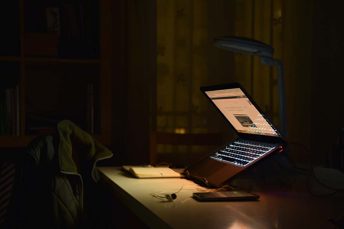 spain gray laptop computer turned on while in tilting position laptop