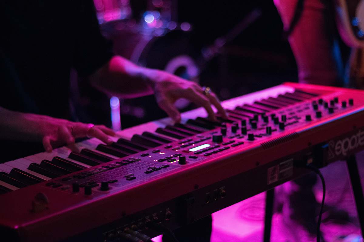 keyboard person playing electronic keyboard piano