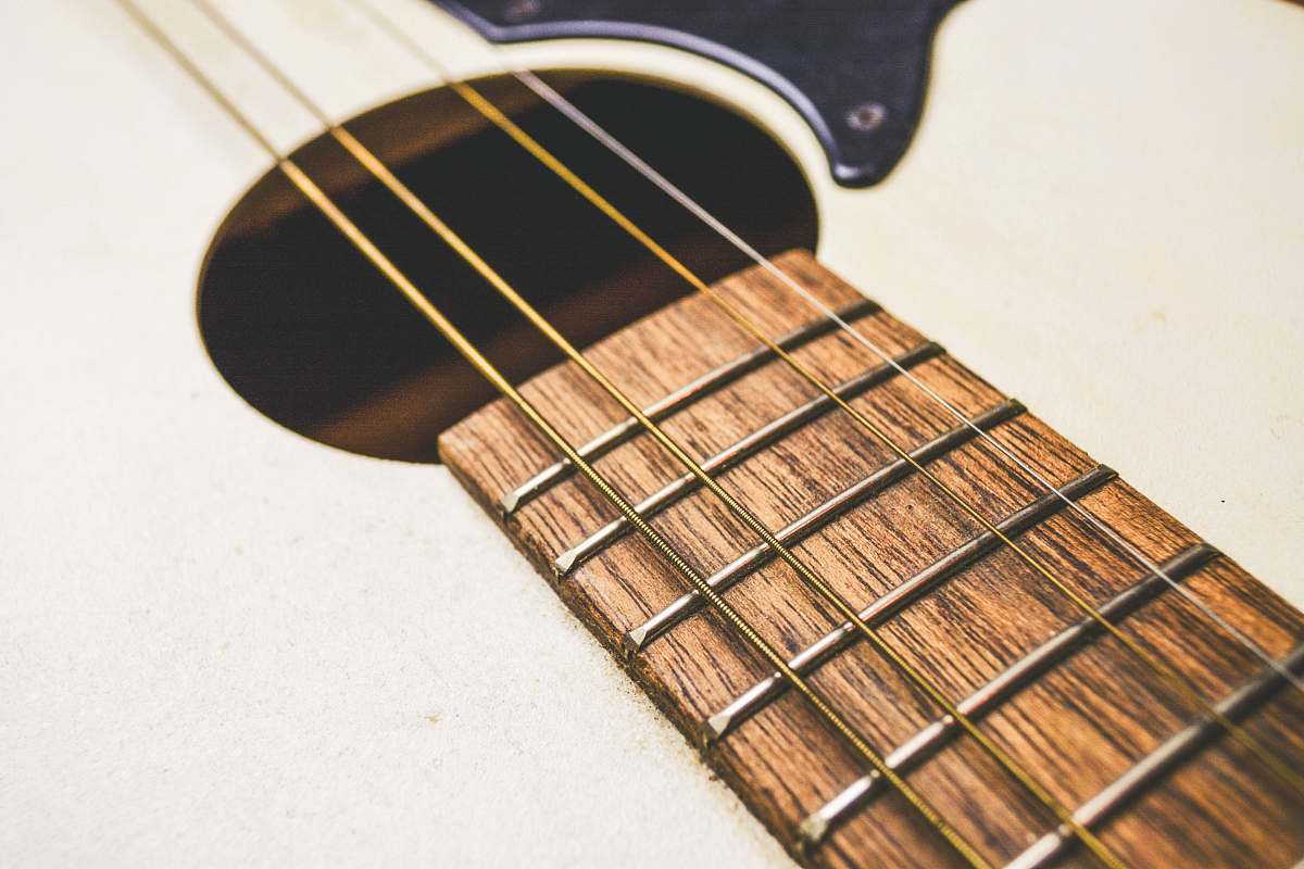 guitar beige and brown acoustic guitar strings