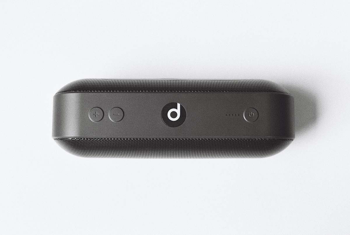 grey black Beats by Dr Dre beatspill + on white surface electrical device