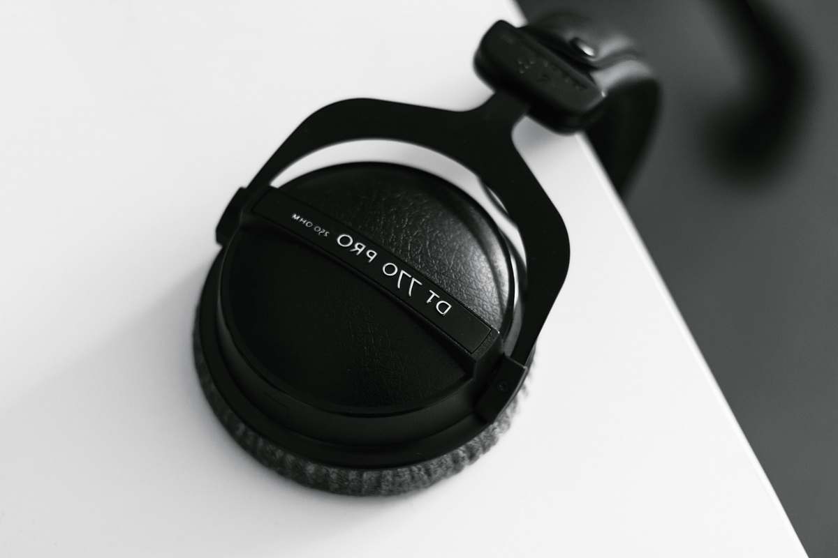 black-and-white black DT 770 Pro headphones on white surface headphones