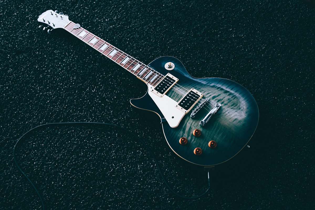 guitar black whiskered single-cutaway electric guitar electric guitar