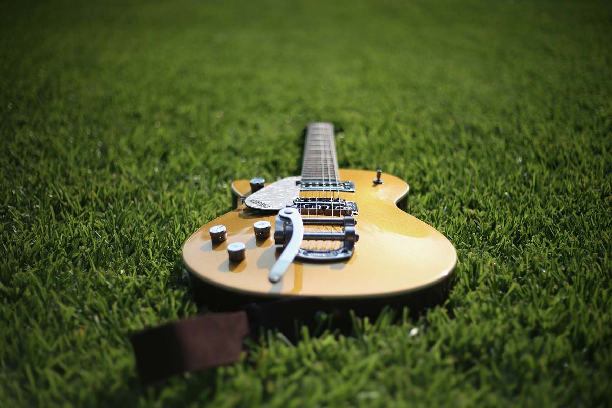 guitar jazz acoustic guitar on lawn electric guitar