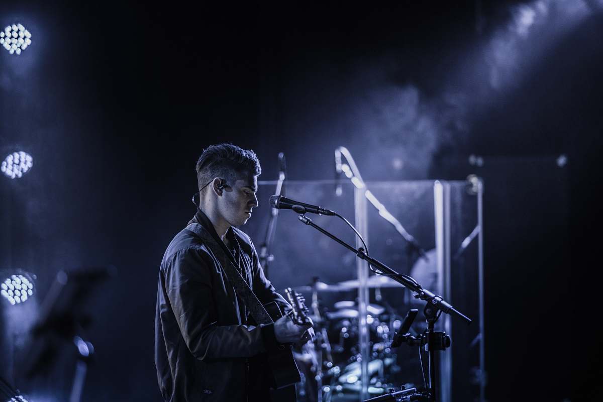 human man playing guitar person