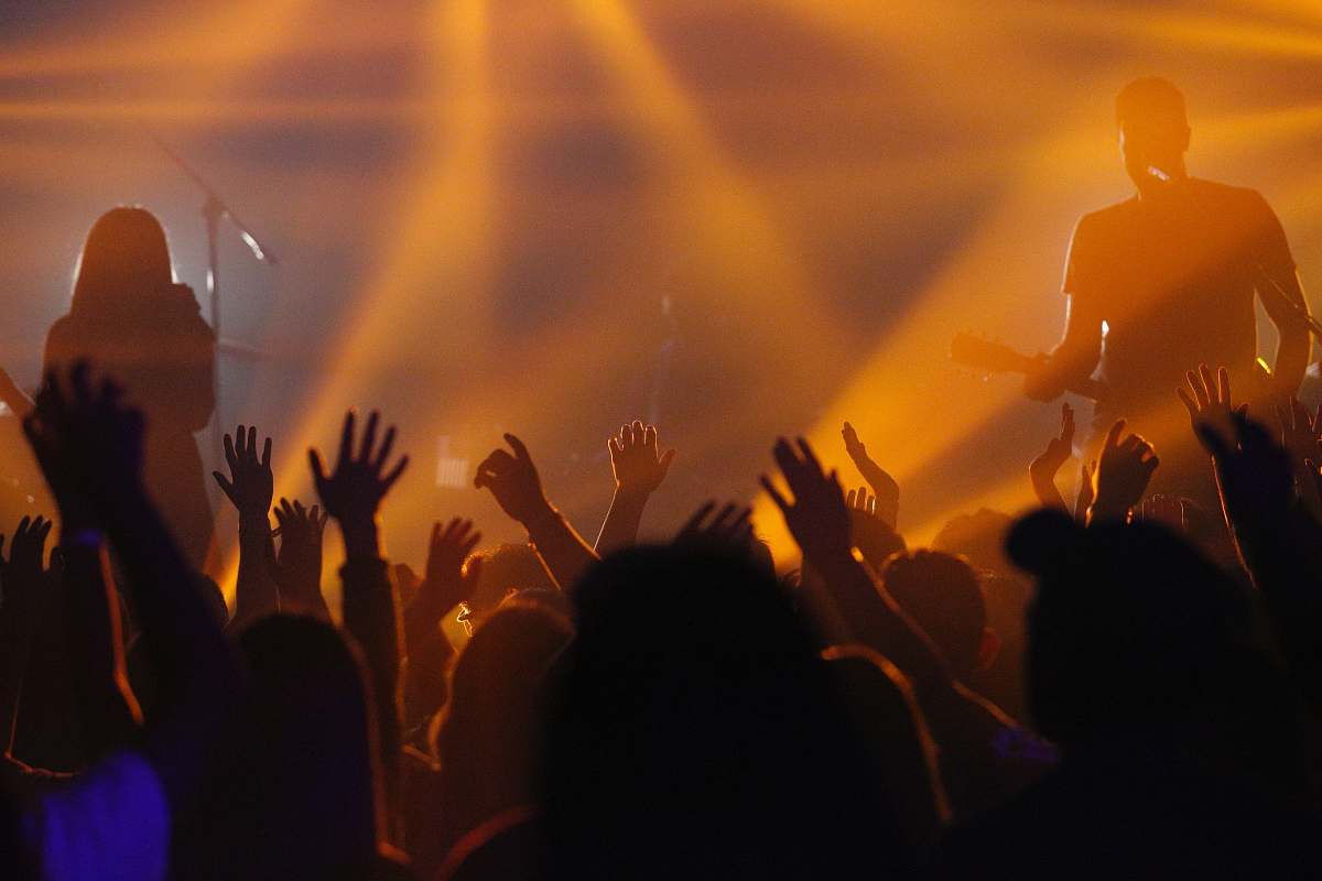 crowd people raising hands on concert concert