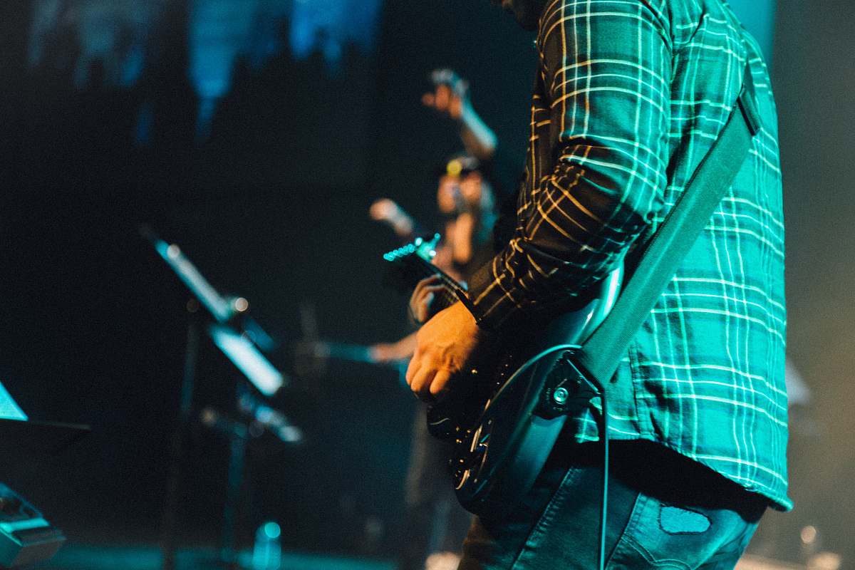 guitarist person playing electric guitar guitar